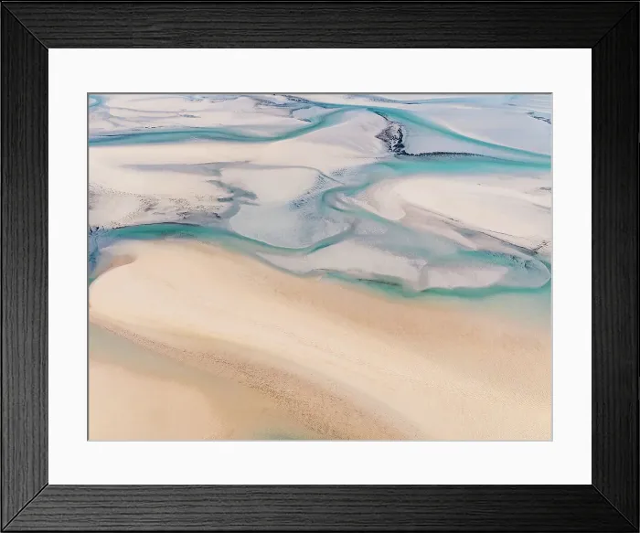 Framed Print : Streams of water flowing in Willie Creek estuary at low tide shot from an aerial perspective, The Kimberley, Western Australia, Australia