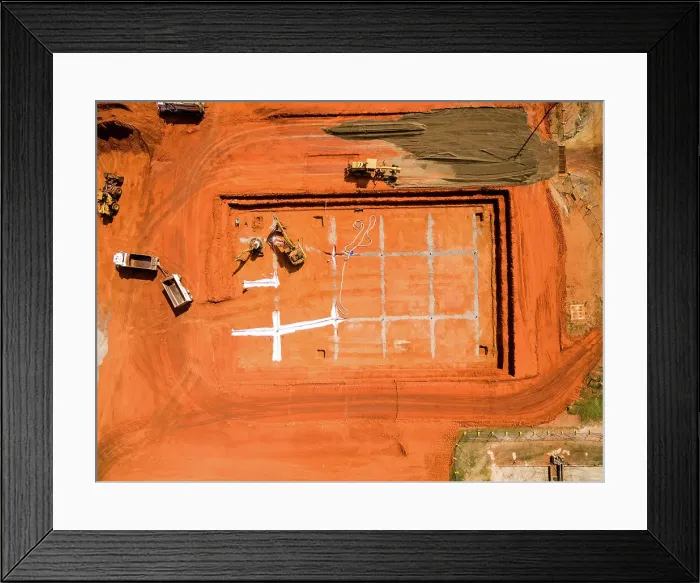 Framed Print : Aerial View of Construction Site With Gridded Foundation