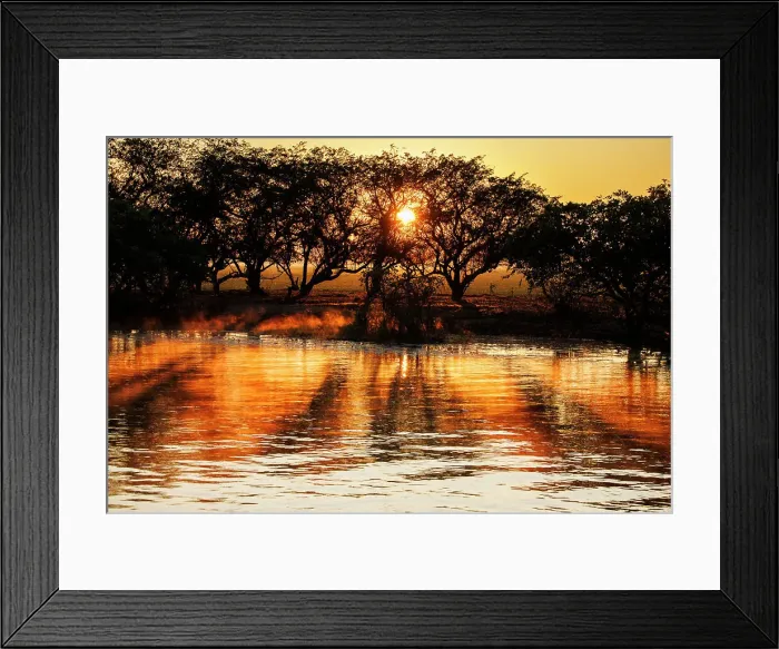 Framed Print : Sunrise over water