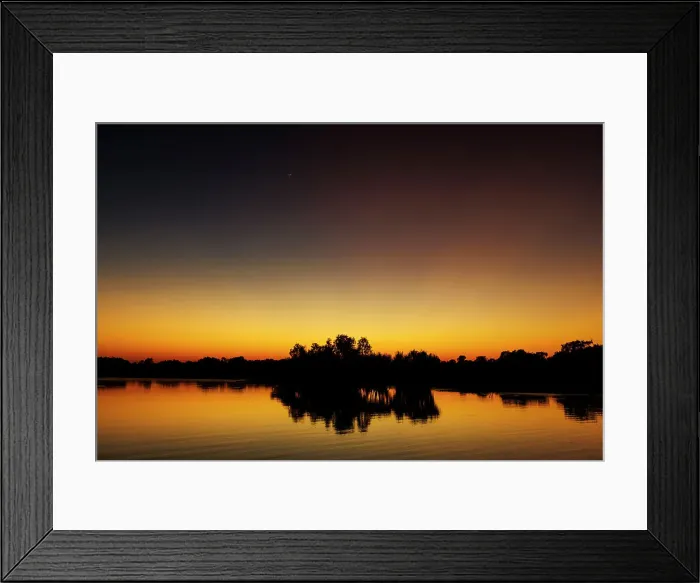 Framed Print : Sunrise over water