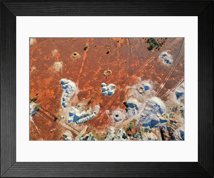 Framed Print : Desert landscape with mineshaft holes, white dirt mine tailings on red earth, White Cliffs, Australia