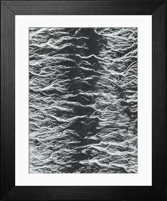Framed Print : Drone photo looking down on abstract patterns of Ocean water created by a spring tide