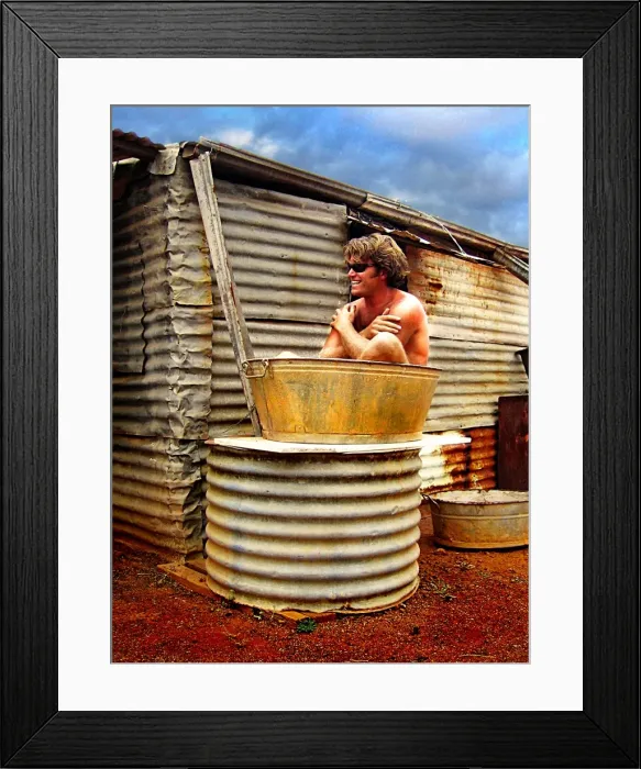 Framed Print : Man Sitting in a Bath Tub Framed Print : Man Sitting in a Bath Tub