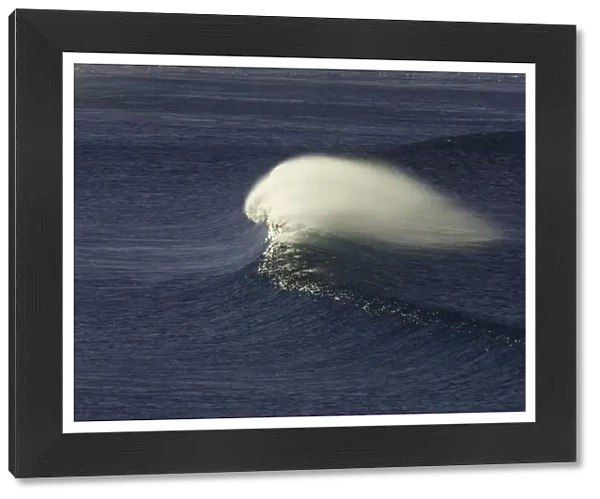 Single wave rushing toward beach, Australia