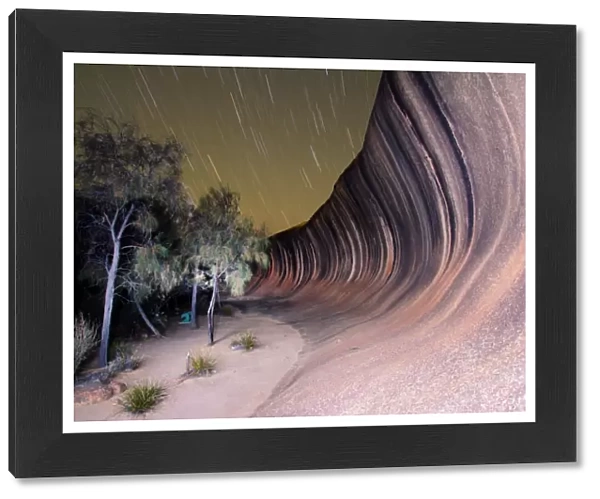 Wave rock. View of wave rock at night with star trails, Western Australia