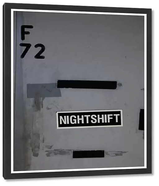 NIGHTSHIFT sign on a wall