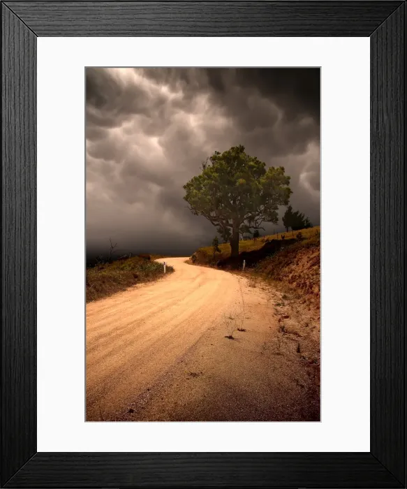 Framed Print : Country Road Against Dark Clouds Framed Print : Country Road Against Dark Clouds
