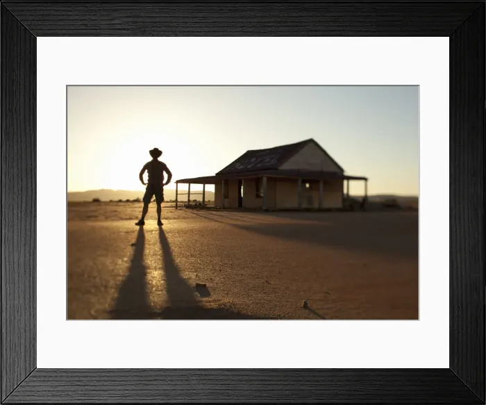 Framed Print : man in front of outback shed