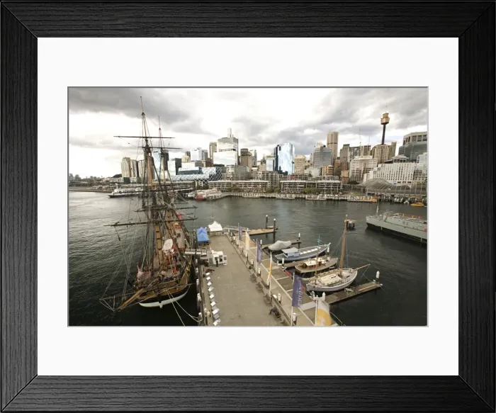 Framed Print : famous old boat sits in harbor or modern city