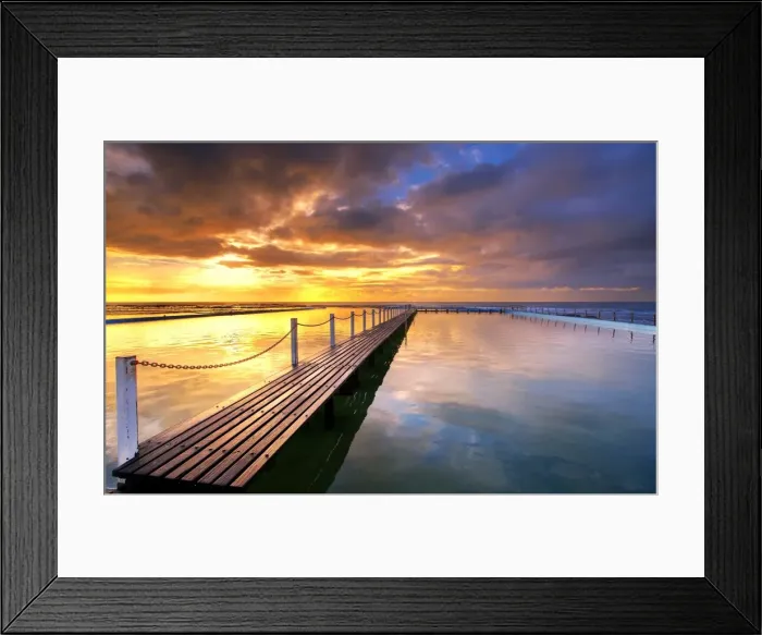 Framed Print : Morning Sun Reflecting on Seaside Pool