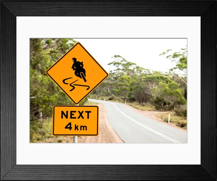 Framed Print : Warning sign for motor bikes. Tasmania. Australia