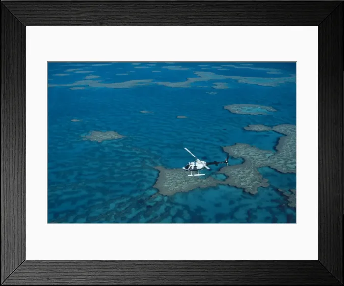 Framed Print : Helicopter over coral reef