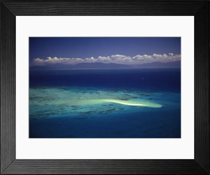 Framed Print : Coral reef and sand cay