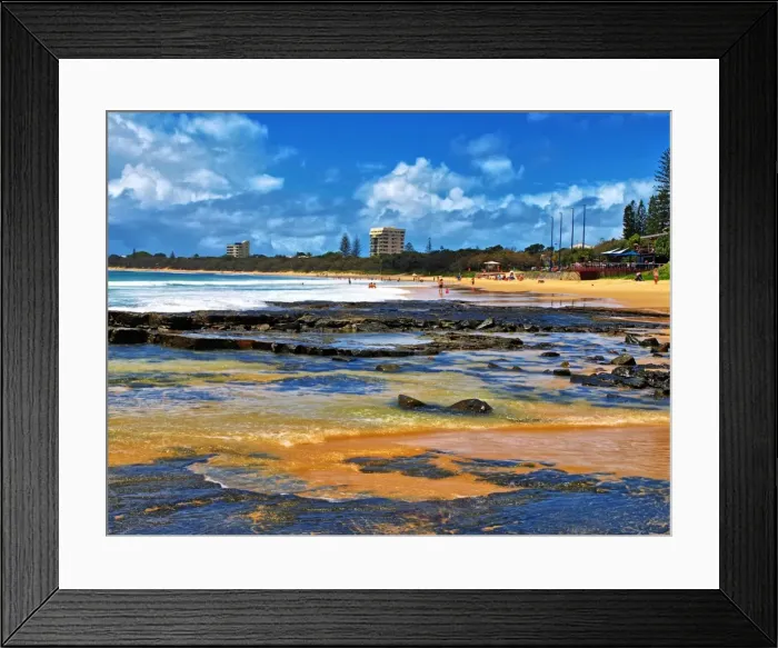 Framed Print : Water, sand, rocks and sky at the beach