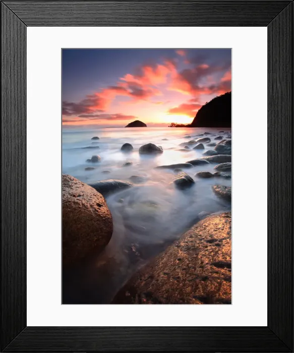 Framed Print : Rocks in ocean at sunrise Framed Print : Rocks in ocean at sunrise