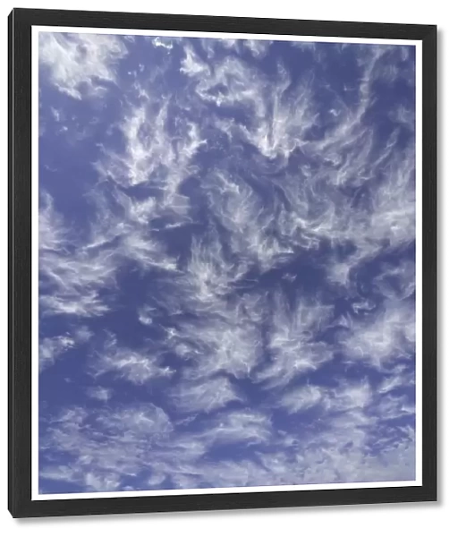Dramatic cirrus clouds in blue sky, Australia