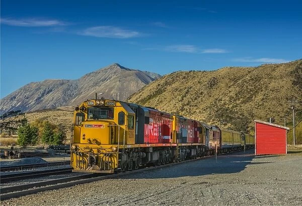 591945664. Train travelling through Arthurs Pass, South Island of New Zealand