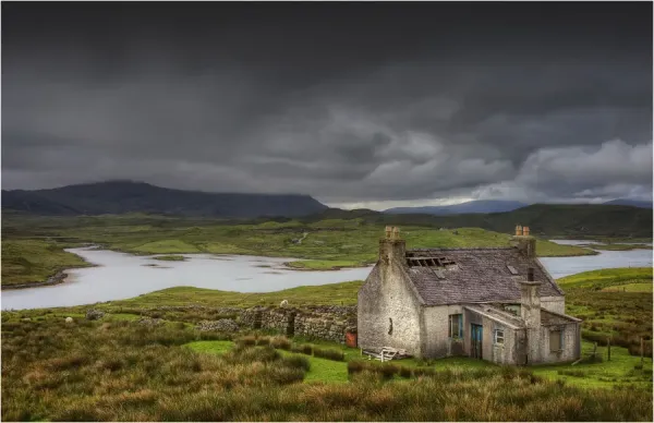 Abandoned Crofters Cottage In The Countryside Of The Isle Of Lewis