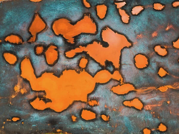 Abstract drone shot of a bizarre iron ore storage pond, Australia