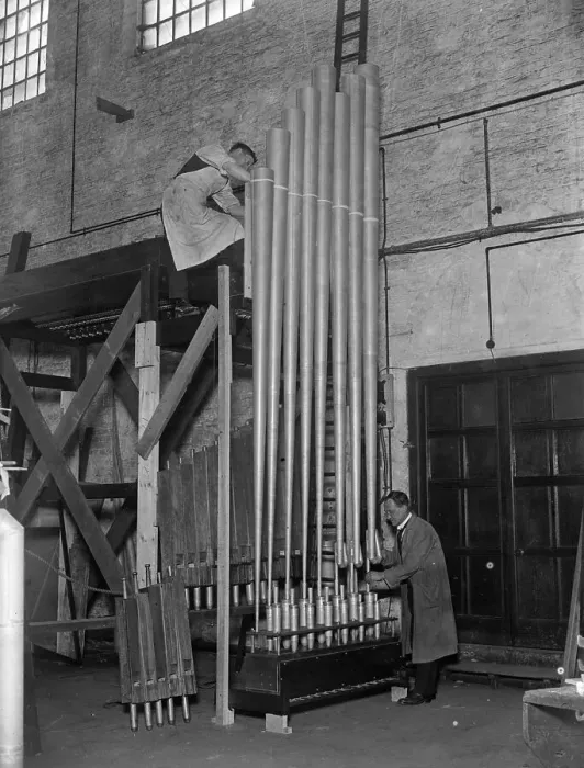 Framed Print : Adjusting The Pipes