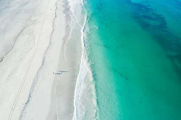 Aerial drone view of white sandy beach