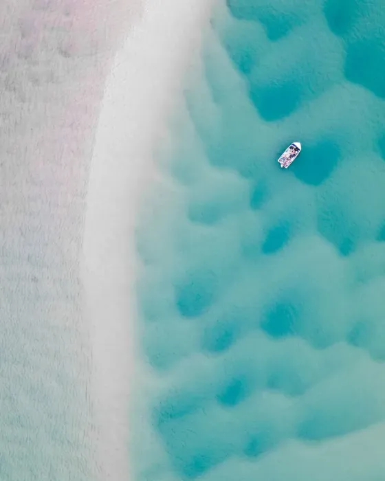 Framed Print : Aerial shot of a boat and river bed textures, Noosa, Australia