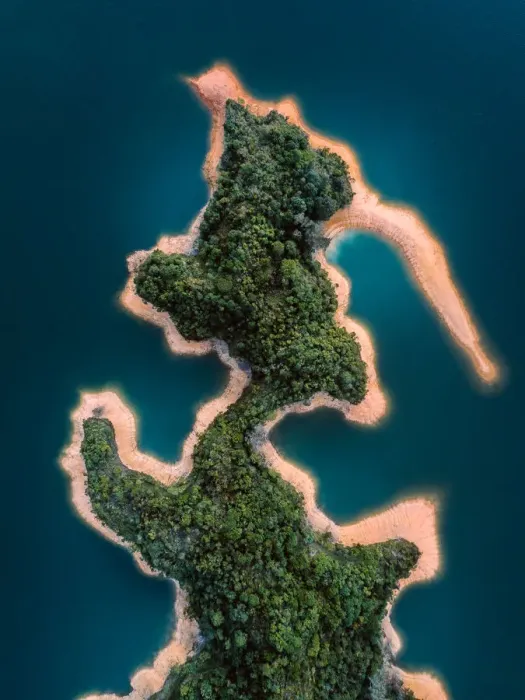 Framed Print : Aerial shot of unique shaped island with a forest, Hong Kong Framed Print : Aerial shot of unique shaped island with a forest, Hong Kong