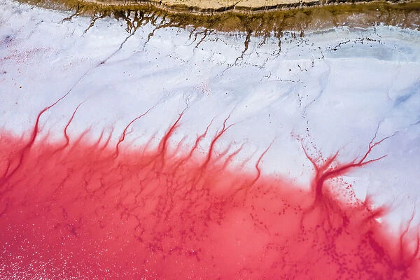 Aerial view of patterns of salty pink lake. Pink Salt Lake Hutt Lagoon