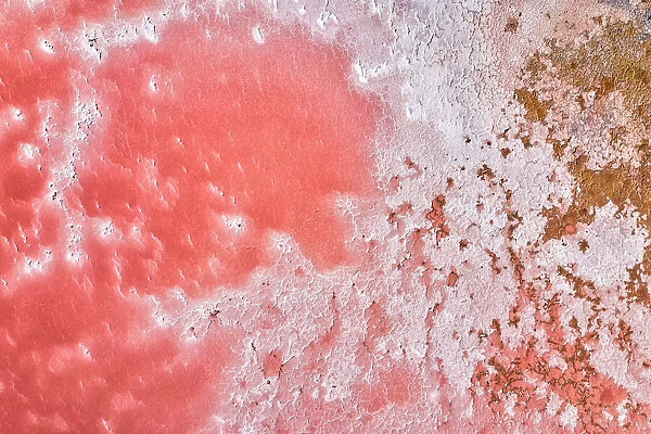 Aerial view over a pink salt lake in South Australia
