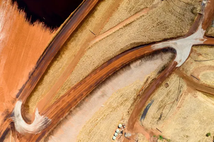Framed Print : Aerial view of a road leading to a bauxite tailings dam Framed Print : Aerial view of a road leading to a bauxite tailings dam