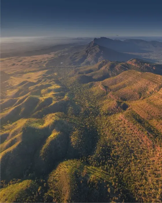 Framed Print : An aerial view of the rugged and scenically beautiful mountain ranges of Wilpena Pound in the southern region of the Flinders Ranges National Park in South Australia