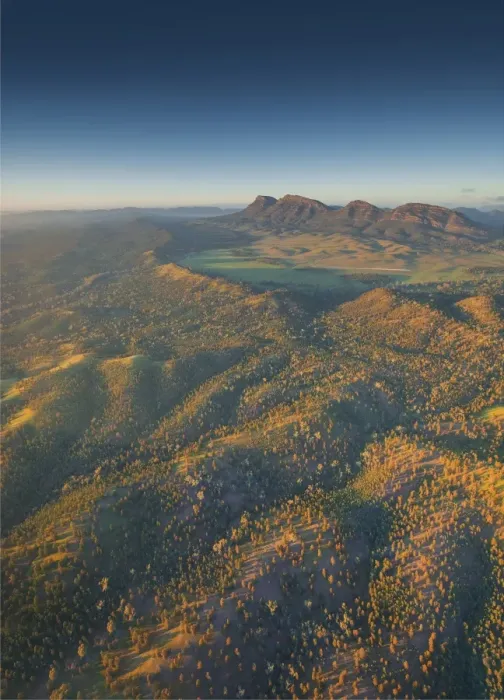 Framed Print : An aerial view of the rugged and scenically beautiful mountain ranges of Wilpena Pound in the southern region of the Flinders Ranges National Park in South Australia