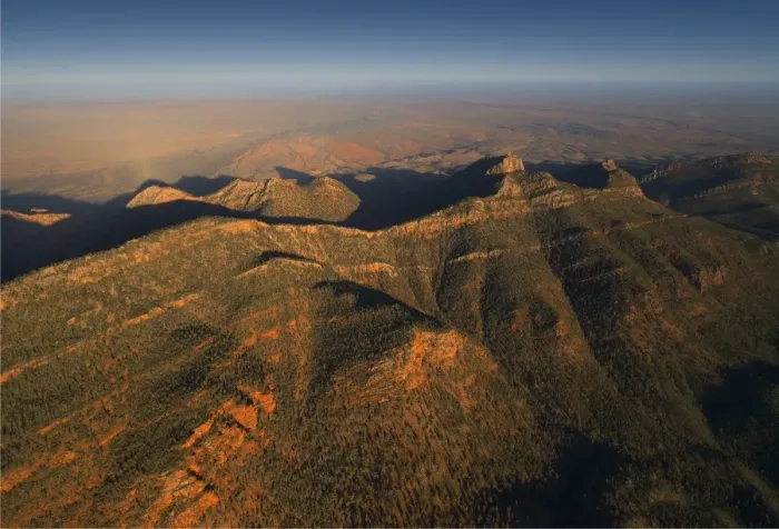 Framed Print : An aerial view of the rugged and scenically beautiful mountain ranges of Wilpena Pound in the southern region of the Flinders Ranges National Park in South Australia