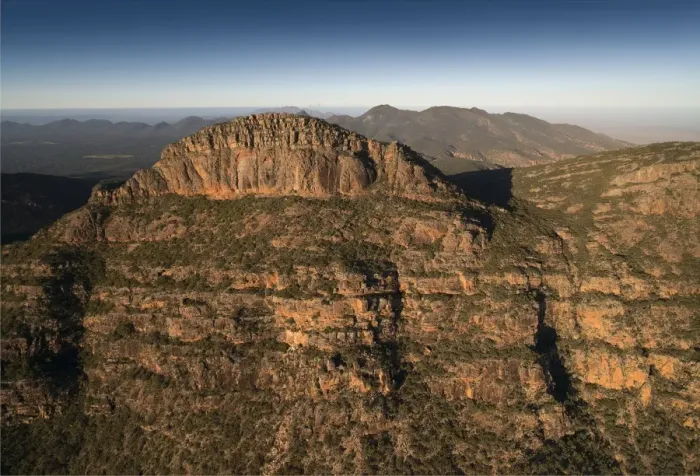 Framed Print : An aerial view of the rugged and scenically beautiful mountain ranges of Wilpena Pound in the southern region of the Flinders Ranges National Park in South Australia Framed Print : An aerial view of the rugged and scenically beautiful mountain ranges of Wilpena Pound in the southern region of the Flinders Ranges National Park in South Australia