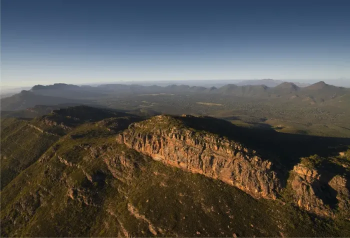 Framed Print : An aerial view of the rugged and scenically beautiful mountain ranges of Wilpena Pound in the southern region of the Flinders Ranges National Park in South Australia Framed Print : An aerial view of the rugged and scenically beautiful mountain ranges of Wilpena Pound in the southern region of the Flinders Ranges National Park in South Australia