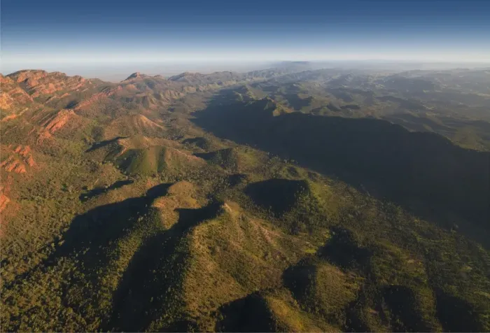 Framed Print : An aerial view of the rugged and scenically beautiful mountain ranges of Wilpena Pound in the southern region of the Flinders Ranges National Park in South Australia Framed Print : An aerial view of the rugged and scenically beautiful mountain ranges of Wilpena Pound in the southern region of the Flinders Ranges National Park in South Australia