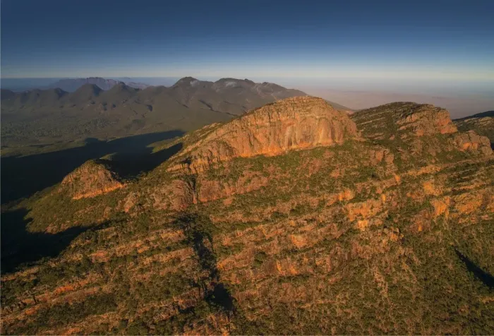 Framed Print : An aerial view of the rugged and scenically beautiful mountain ranges of Wilpena Pound in the southern region of the Flinders Ranges National Park in South Australia Framed Print : An aerial view of the rugged and scenically beautiful mountain ranges of Wilpena Pound in the southern region of the Flinders Ranges National Park in South Australia