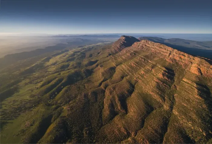 Framed Print : An aerial view of the rugged and scenically beautiful mountain ranges of Wilpena Pound in the southern region of the Flinders Ranges National Park in South Australia