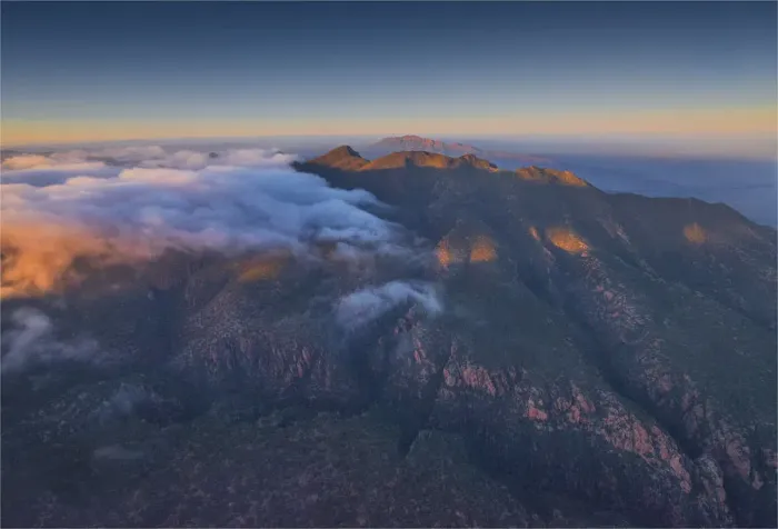 Framed Print : An aerial view of the rugged and scenically beautiful mountain ranges of Wilpena Pound in the southern region of the Flinders Ranges National Park in South Australia