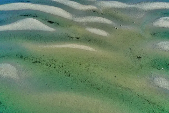 Framed Print : Aerial view of some sandbars forming as the tide goes out Framed Print : Aerial view of some sandbars forming as the tide goes out