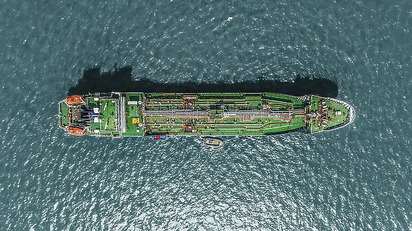 Aerial view tanker ship anchor parking in sea, Crude oil tanker ship and LPG tanker ship loading in bay at sunset, Bulk boat anchor