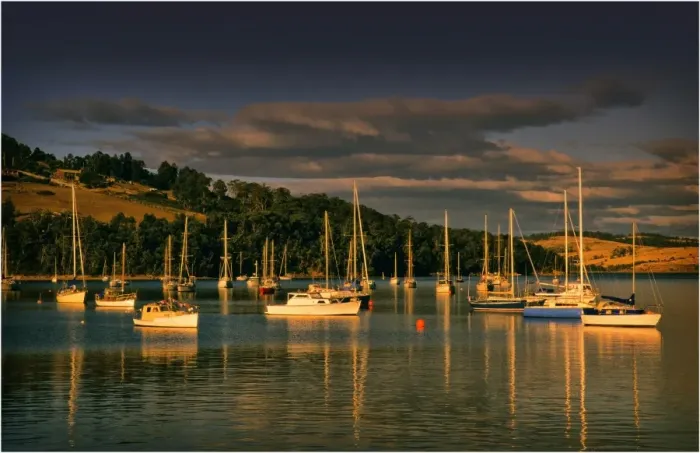 Framed Print : Afternoon light sweeps across the moored boats in the protected and picturesque bay at Kettering, southern Tasmania