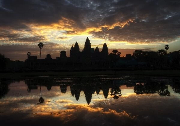 Angkor Wat temple sunrise water reflections