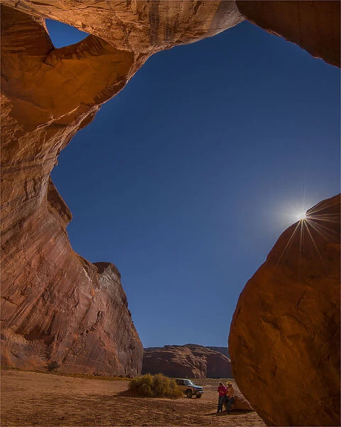 An Archway and sunstar in Monument valley, Arizona, Western united States of America