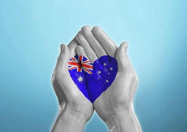 australia heart shaped flag painted on a hand