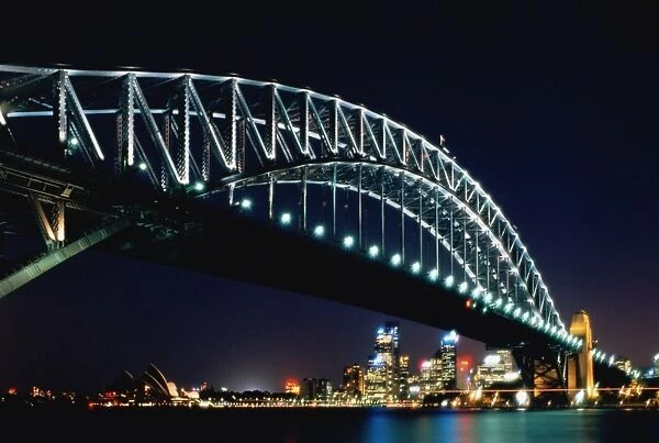 Australia, Sydney, Harbour Bridge with Opera House and city, at night