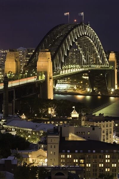 Australia, Sydney, Sydney Harbour and Bridge at night, elevated view