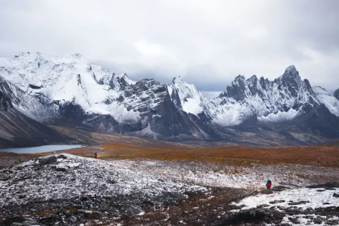 Framed Print : Backpacker with tombstone mountain