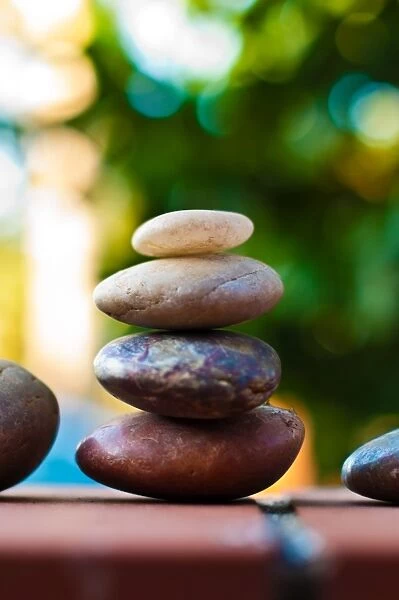Balance. Coloured pebble stone stack
