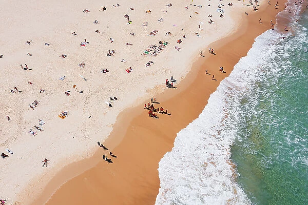 Beach aerial full of people in summer, Australia